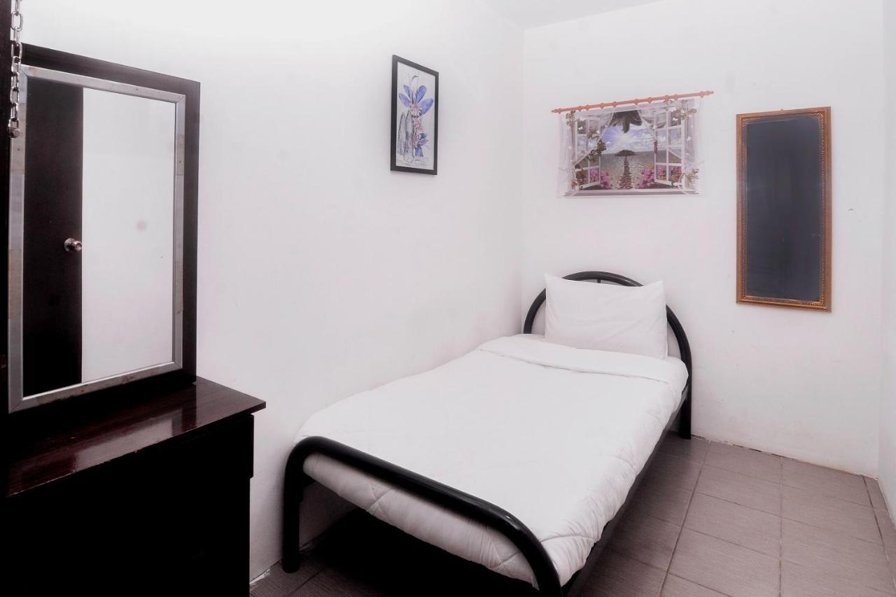 Spot On 89886 Backpacker'S Stay Services Кучинг Экстерьер фото