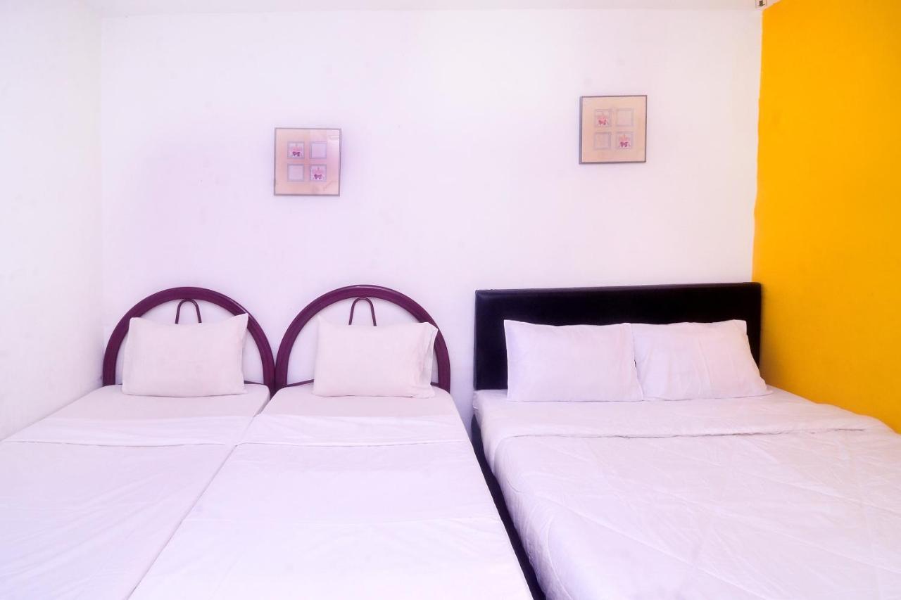 Spot On 89886 Backpacker'S Stay Services Кучинг Экстерьер фото